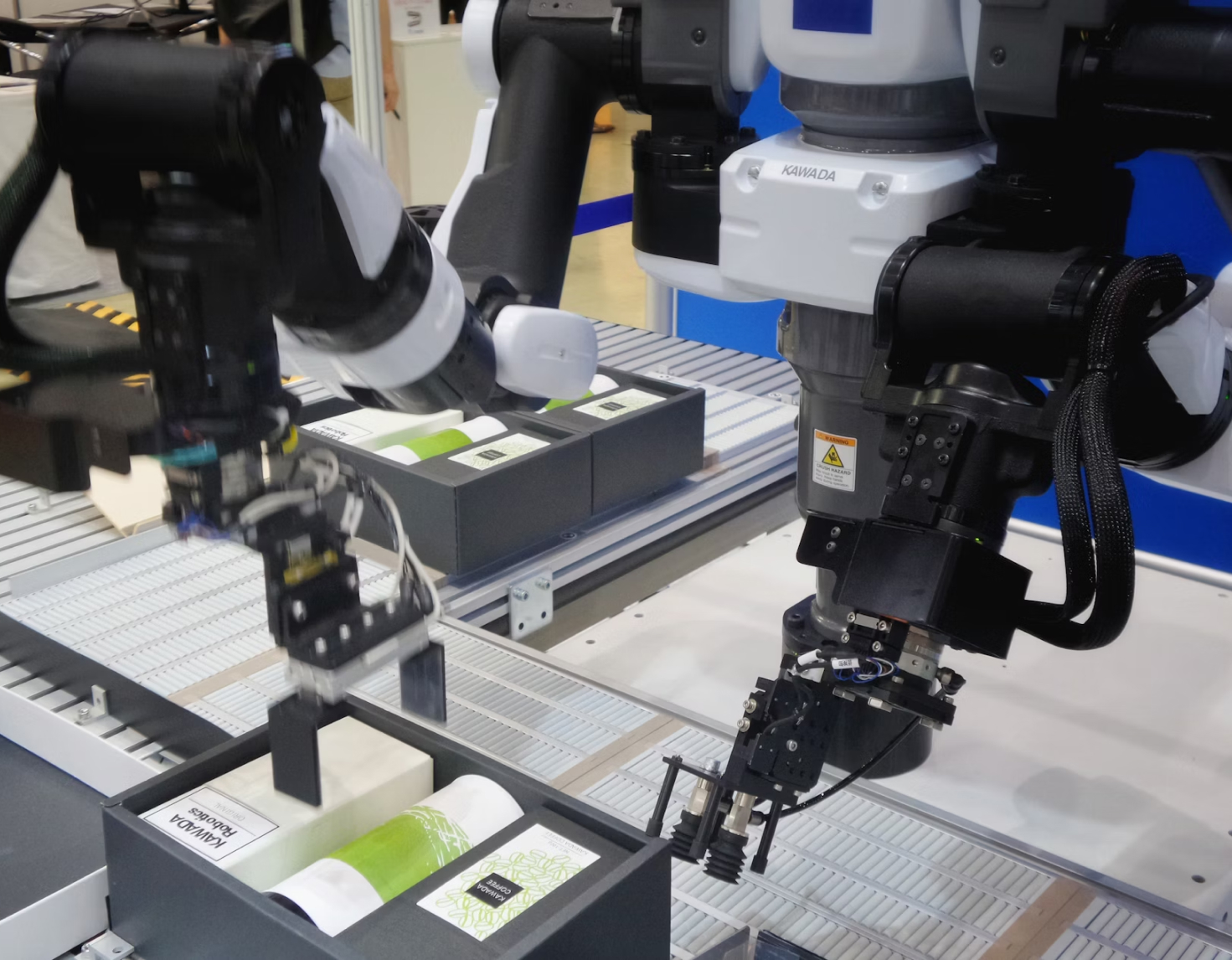 Image of robot arm sorting products